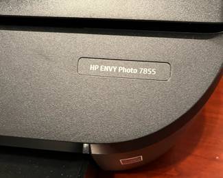 R74 - $40. HP Envy Photo Printer with extra ink. 