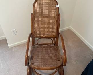 R19 - $50. Vintage Single Caned Rocking Chair. Measures 19.5" x 17" x 40.25" tall. 