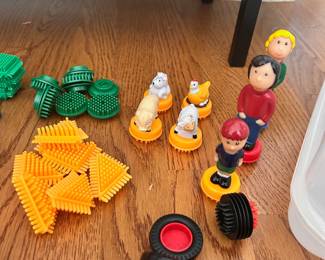 R23 - $20. Battat Bristle Blocks with Family & Farm Animals in storage case. 
