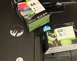 R74 - $40. HP Envy Photo Printer with extra ink. 