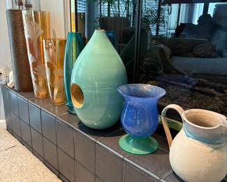 Home Decor. Many colorful accent vases and Navajo inspired decor. Glass vases. green blue, turquoise, brown and bronze.