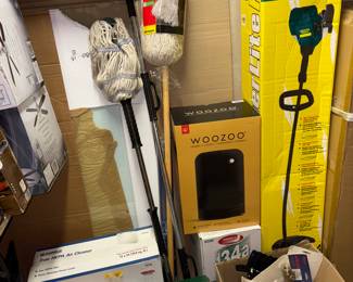 New in box weed whipper. Woozoo ceramic pot fan heater. Pyromid outdoor cooling systems. New, never used mops.