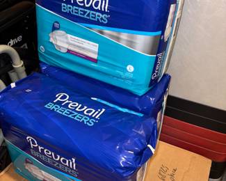 Unopened packages of adult diapers for incontinence