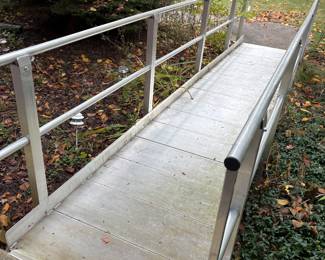 Aluminum wheelchair ramp in good condition.