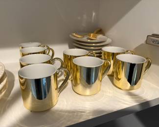 Gold colored espresso cup set.