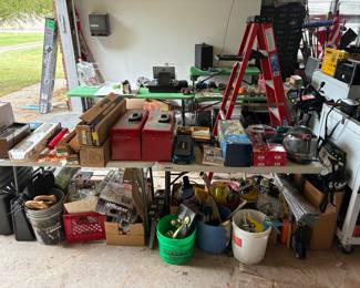 Tool kits. doorknobs, windshield covers (for summer heat). New in box weed whip. Brand new storage totes and garbage cans included in sale.