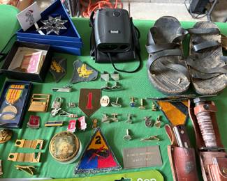 Vintage Vietnam memorabilia. Swarovski Crystal ornaments, Bushnell range finder.