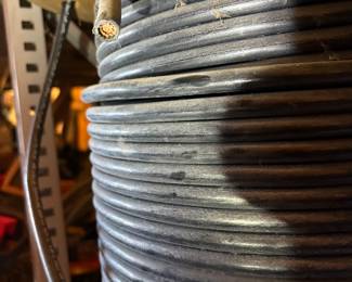 Multiple spools of copper cable wire available