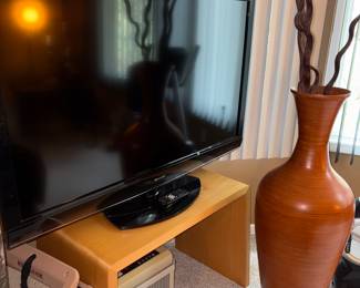 Large flat screen TV. Shredder and lap top tray.
