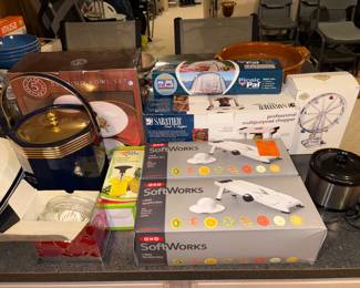 New in box OXO soft works mandolin for food slicing. Multiple available. Professional food chopper, brand new camping tent. Vintage ice bucket.