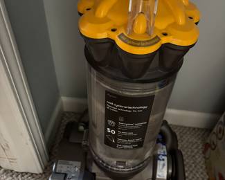 Dyson DC 33 upright vacuum cleaner.