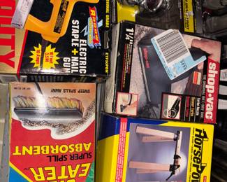 New in box! Sawhorse, shop vac, electric staple and nail gun.