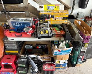 New in Box drills, Stanley tools, new in box bird feeder. New in box (opened but never used) bike rack. So many garage storage items, license plates, batteries and more.
