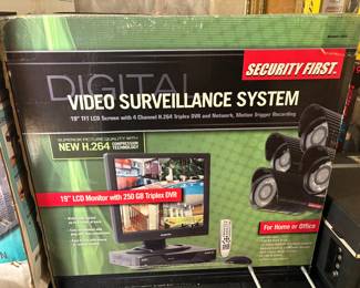 New in box video surveillance system by Security First. Four Cameras and a 19" LCD Monitor with remote.