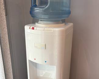 Filtered water cooler for hot and cold water.
