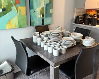 5-piece breakfast nook table for sale. Gray wood with four leather chairs.