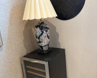 Home decor. Wall art, table lamps and beverage fridges.