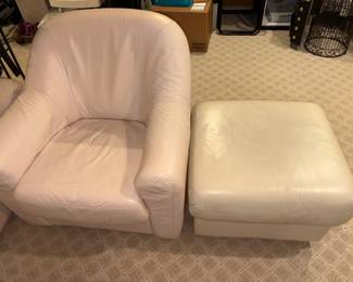 White leather accent chair with ottoman. In excellent condition
