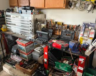 New in box Craftsman socket set. Drill bits, Champion Workhorse auto feed trap. Hammers, and so many tools for sale.