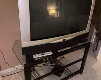 Large TV and TV stand for sale.