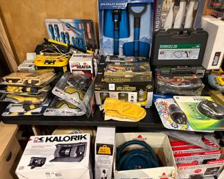 New in box travel shovels, winches, workman's gloves, protective glasses, drills. Wolfgang Puck Grill Set. Weber grilling equipment. Honeywell LED lights. Multiple of most available.