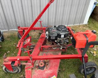Gas powered tractor pull behind lawn mower