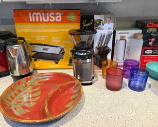 New in Box Imusa grill, percolators, coffee bean grinder. New in box Waterdrop, colorful cups and serving ware.