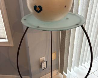 Tall side or accent table. Balck wrought iron with a glass top. Home decor, decorative Navajo vase/pot available.