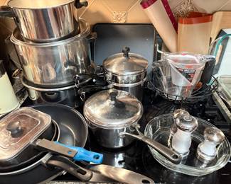 Pots and pans by All-clad, Revere ware, cast-iron, and more