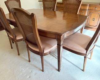 Another view of the dining table with chairs by Henredon