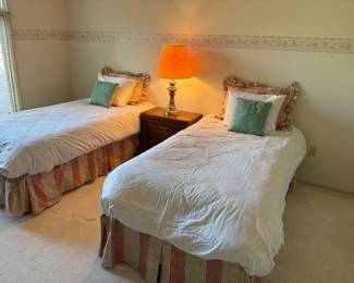 Twin beds with mattresses frames