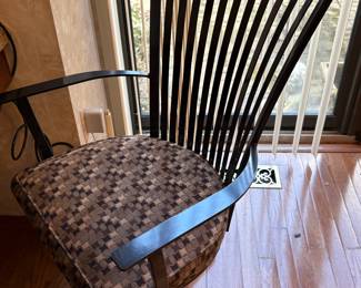 Black metal -swivel dining arm chair with casters - set of five available.