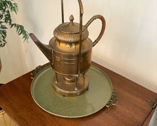 Brass and wood coffee pot on vintage tray