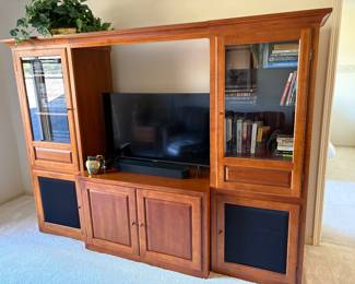 Media cabinet with glass front bookshelves