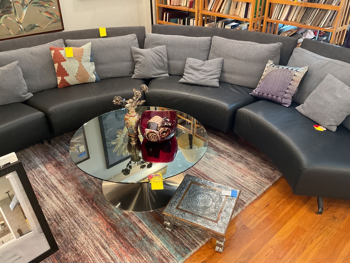 Curved leather and cloth sectional sofa $2100 + tax (depth=35” height of seat=14” height of back=30” length of each section=58”)