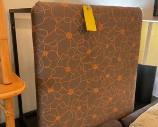 Brown and orange floral motif ottoman (15” tall x 28” x 28”)