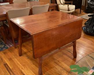 Hardwood double folding leaf table (29” tall x 36” x 26” with leaves down. Each leaf 13”) $280 + tax