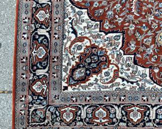 Red, white, black, beige area rug