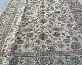 Beige and mauve area rug