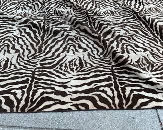 Large brown and cream zebra print rug (20’ x 18’) $1750 + tax