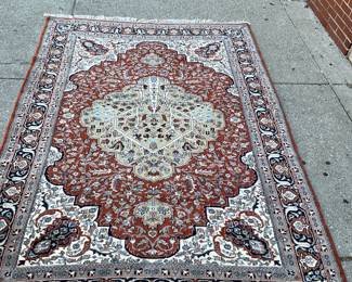 Red, white, black, beige area rug