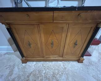 Buffet has matching coffee table and end table 