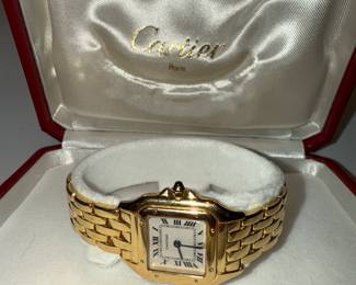 Cartier 18K gold watch, serviced and working.