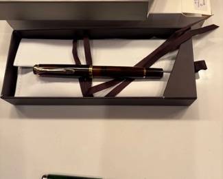 Pelikan M200 Smoky Quartz (in box) and M205 Olivine fountain pens