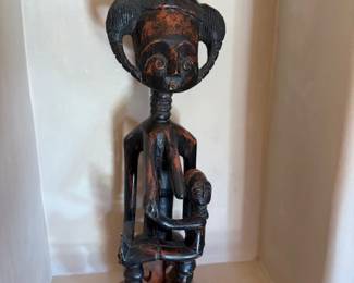 Seated African carved wood maternity figure with child