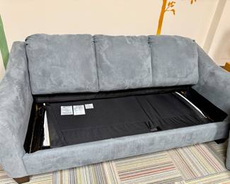 A contemporary Ashley furniture day bed couch. 
