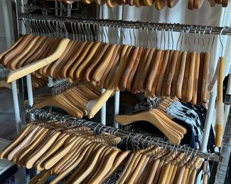 tons of wooden hangers, child + adult sized
