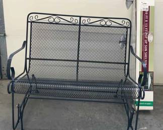 Wrought iron glider, and pop up sun shelter.