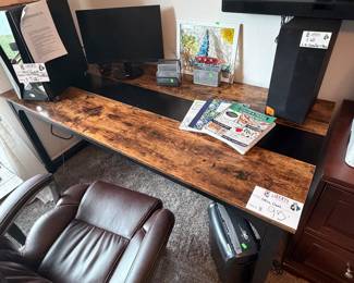beautiful desk and office chair with sound bar, monitor and gaming computer