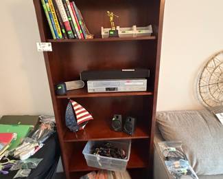 book shelf, books, dvd player and more